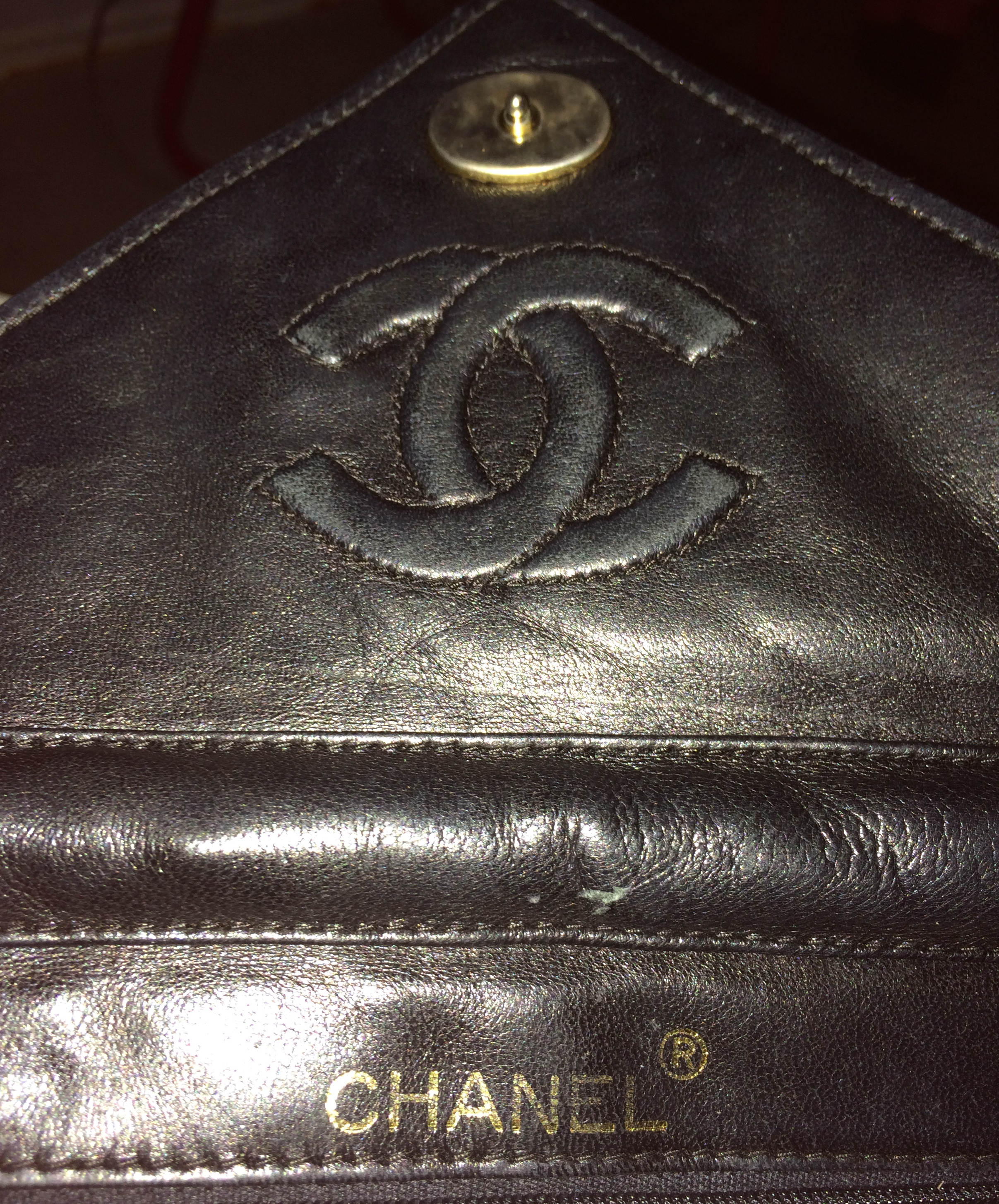 Lot 262  A vintage Chanel black satin evening bag